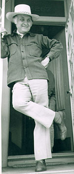 Robert Duncan in the doorway of his house, San Francisco, 1975