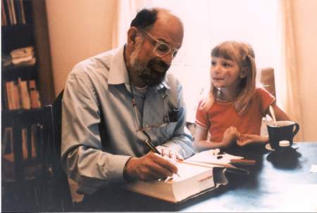 Allen Ginsberg autographs his Collected Poems for Daisy Ball, whose cheek was scratched in a roller-skating fall on May 31, 1986, Jackson, Mississippi. Photo Copyright (c) Gordon Ball, 2006