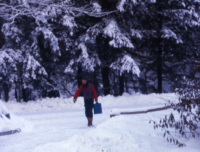 Bob Arnold drawing water for his cabin, 1975 photo Susan Arnold