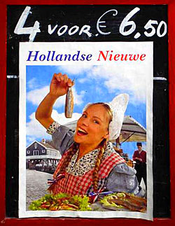 Dutch Girl eating Herring in the Traditional Manner: photo of the photo on the poster by John Tranter